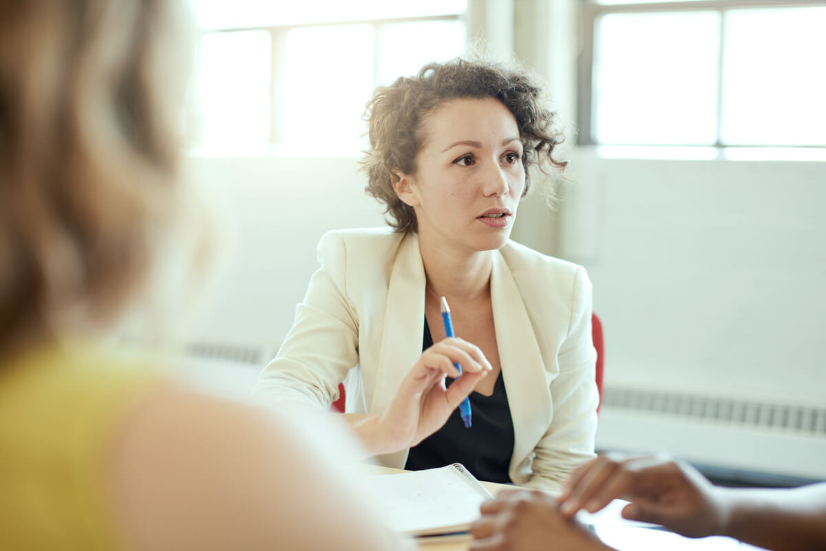 Female lawyer meeting with clients