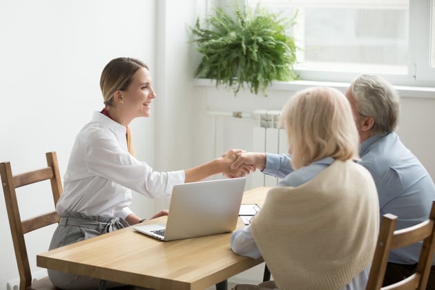 female-lawyer-with-older-couple