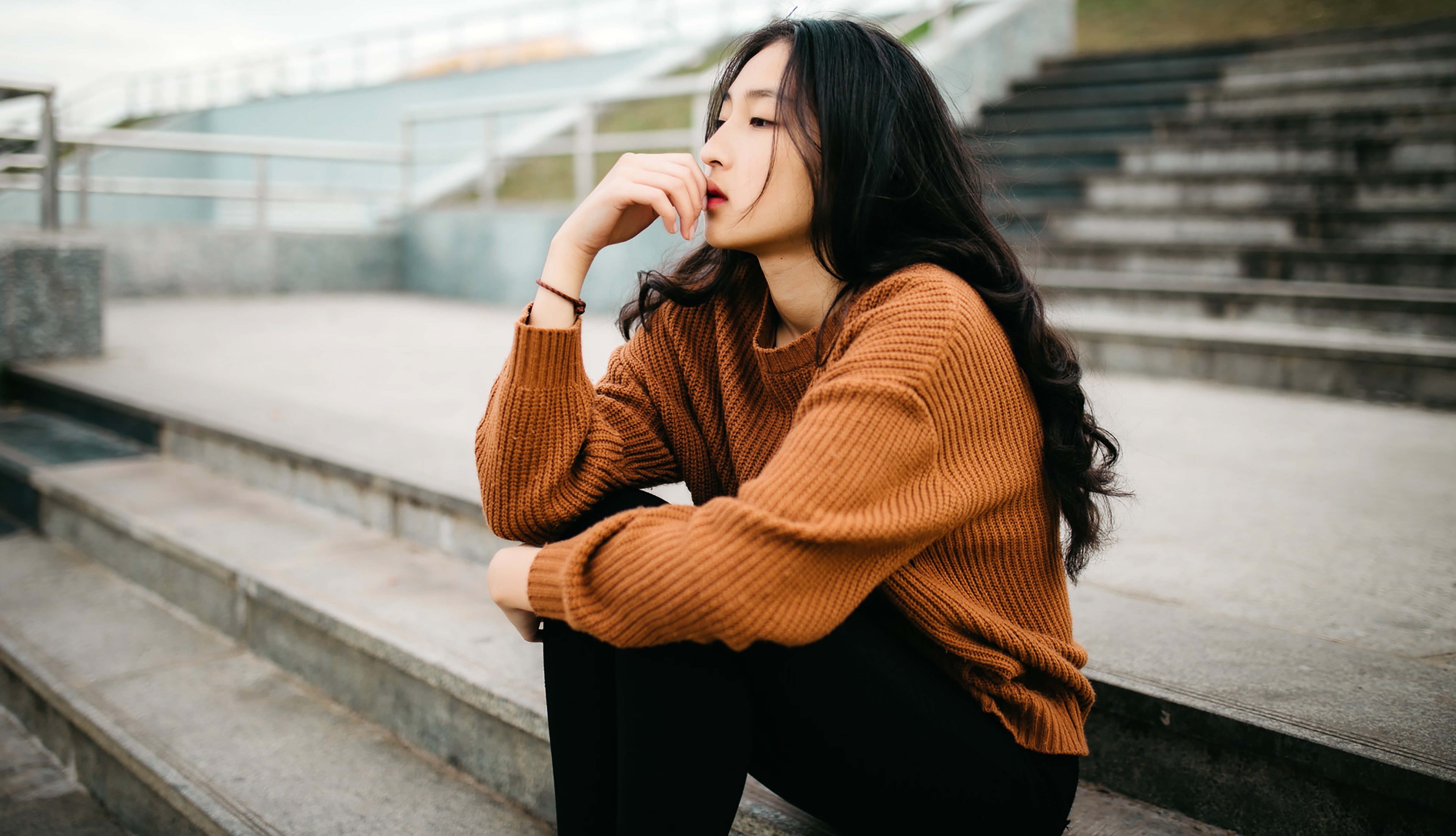 woman sitting on stairs