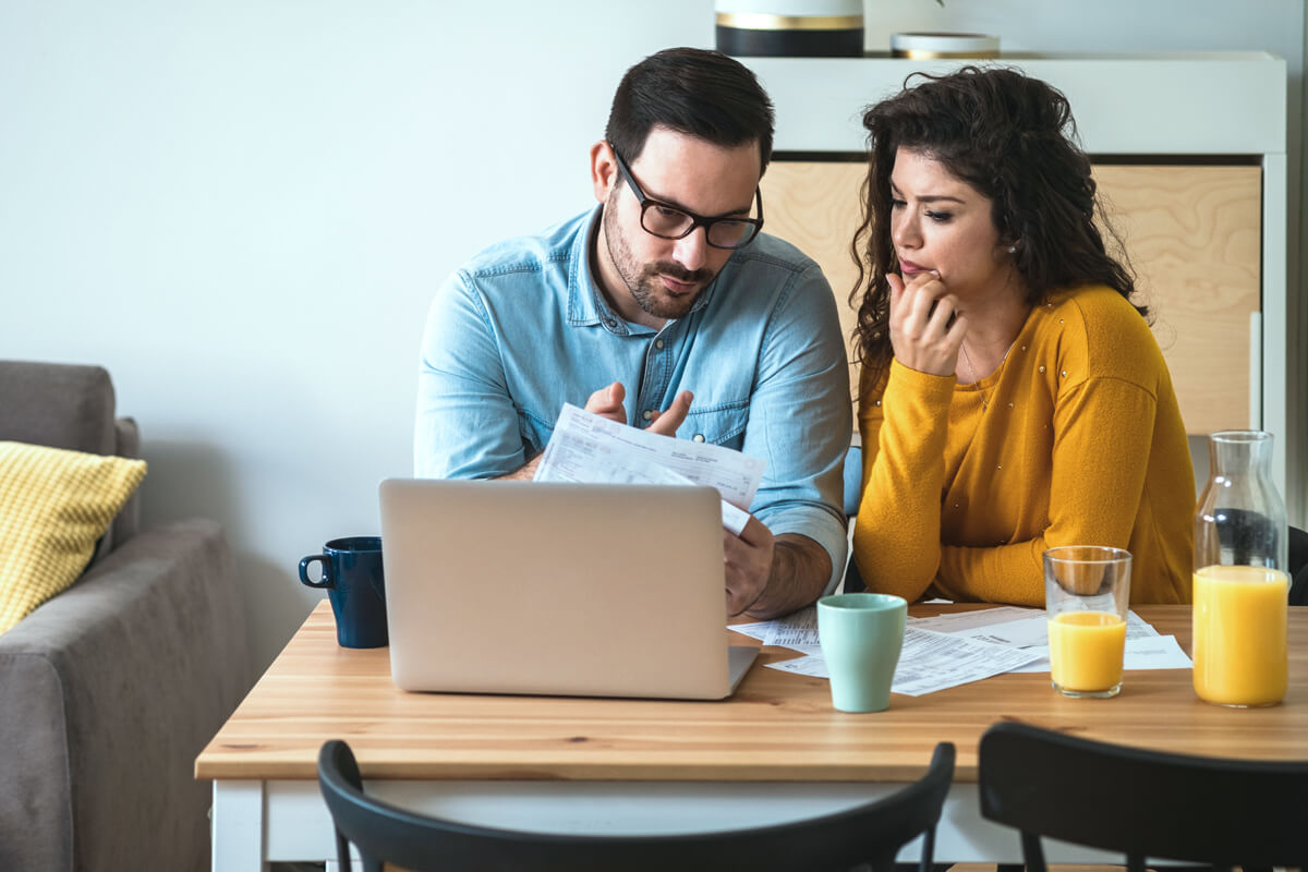 couple-reviewing-documents