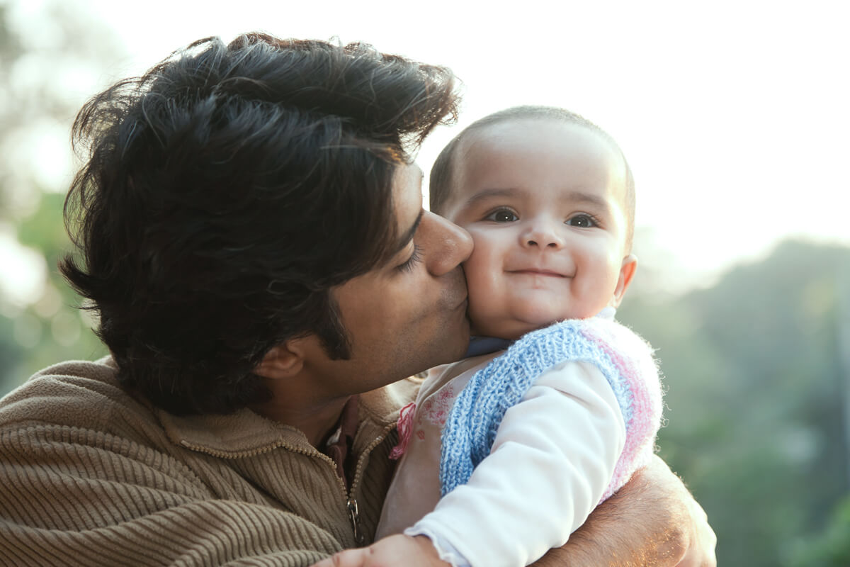 father-kissing-daughter